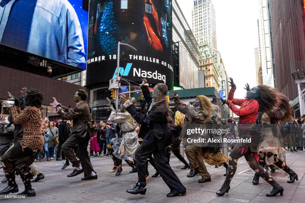 Small Flash Mob People dressed as zombies dance in a