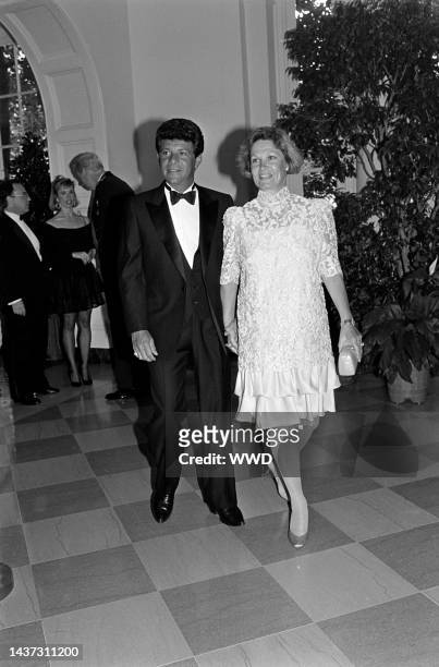 Frankie Avalon and Kathryn Diebel attend a reception at the White House in Washington, D.C., on June 24, 1988.