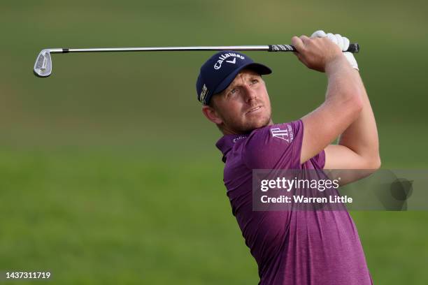 Matt Wallace of Englandplays their second shot on the 18th hole during Day Two of the Portugal Masters at Dom Pedro Victoria Golf Course on October...