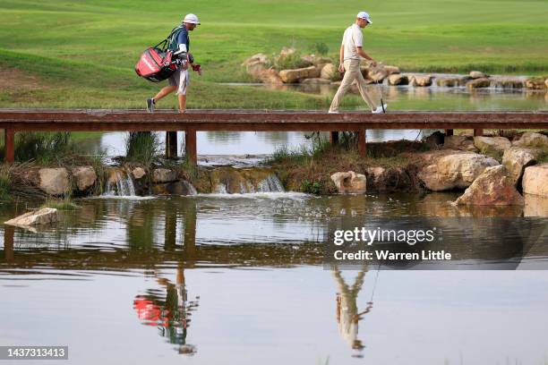 Nicolai Hojgaard of Denmark crosses the bridge to tee off on the 17th hole during Day Two of the Portugal Masters at Dom Pedro Victoria Golf Course...