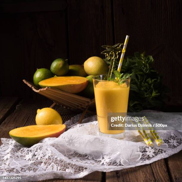 close-up of drink on table - mango juice stock pictures, royalty-free photos & images