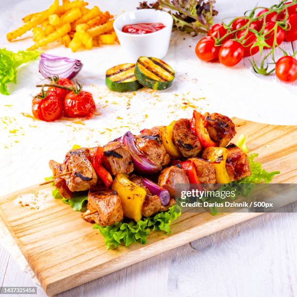 tasty and colorful meat skewers with peppers and onions - kebab stock pictures, royalty-free photos & images