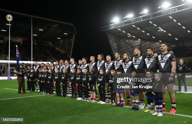 Players of New Zealand line up for the National Anthems ahead of the Rugby League World Cup 2021 Pool C match between New Zealand and Ireland at...