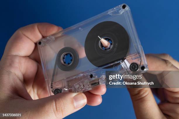 pencil for film rewind on the audio tape - tape recorder stock pictures, royalty-free photos & images