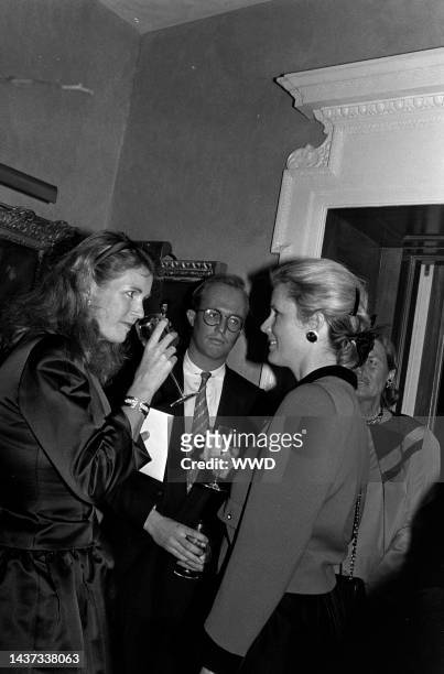 Dailey Pattee, guest, and Hethea Nye attend an event at the Kravis-Roehm residence in New York City on January 8, 1988.