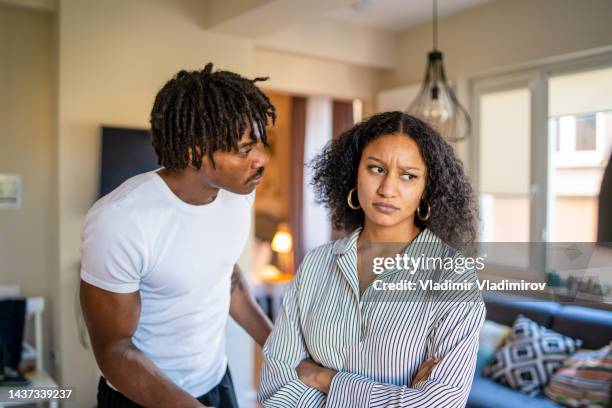 frowning woman after argument with husband - boyfriend girlfriend stock pictures, royalty-free photos & images