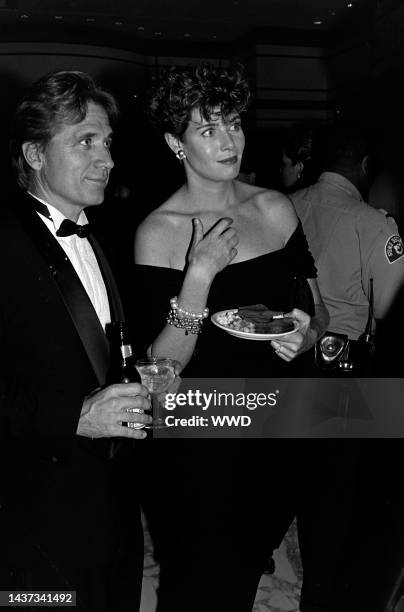 Fred Tillman and Kelly McGillis attend an event in Washington, D.C., on September 14, 1989.