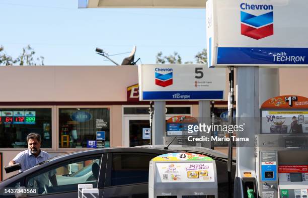 The Chevron logo is displayed at a Chevron gas station on October 28, 2022 in Los Angeles, California. Chevron posted near record profits as their...