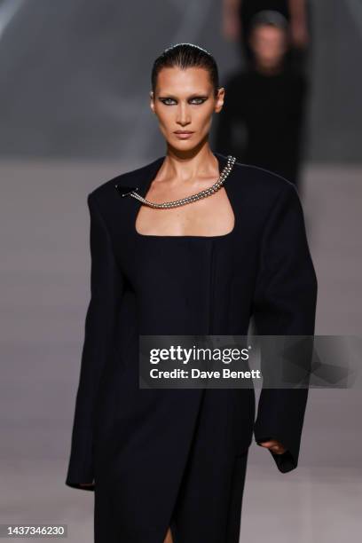 Bella Hadid walks the runway as Naomi Campbell, partnered with Qatar Creates, host a couture fashion and art charity show as part of the EMERGE...