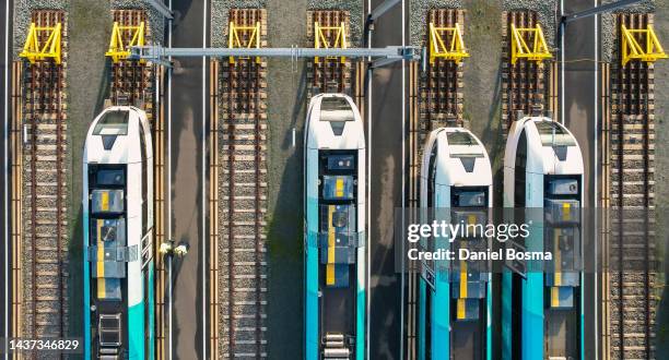 aerial view of rail yard in the netherlands - spoorwegvervoer stockfoto's en -beelden