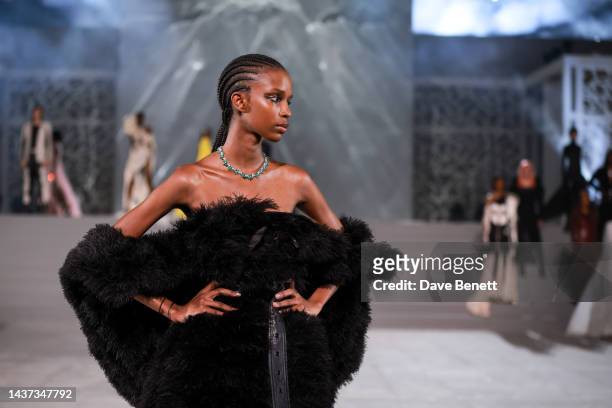 Model walks the runway as Naomi Campbell, partnered with Qatar Creates, host a couture fashion and art charity show as part of the EMERGE global...