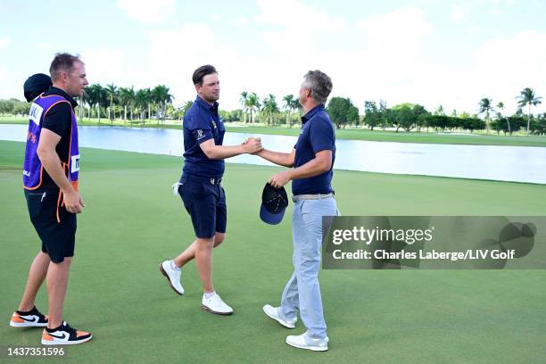 Bernd Wiesberger of Hy Flyers GC and Matt Jones of Punch GC shake hands on the eighth green during the quarterfinals of the LIV Golf Invitational -...