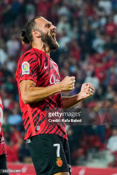 Vedat Muriqi of RCD Mallorca celebrates scoring his team's first goal during the LaLiga Santander match between RCD Mallorca and RCD Espanyol at...