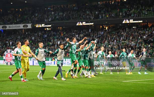 Werder Bremen celebrate victory after the Bundesliga match between SV Werder Bremen and Hertha BSC at Wohninvest Weserstadion on October 28, 2022 in...