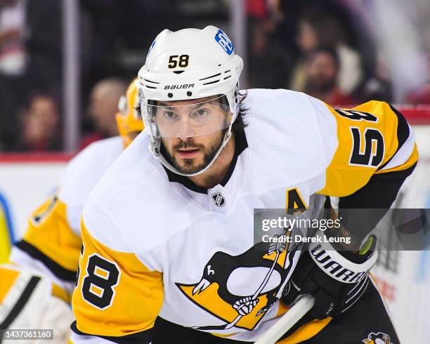 Kristopher Letang of the Pittsburgh Penguins in action against the Calgary Flames during an NHL game at Scotiabank Saddledome on October 25, 2022 in...