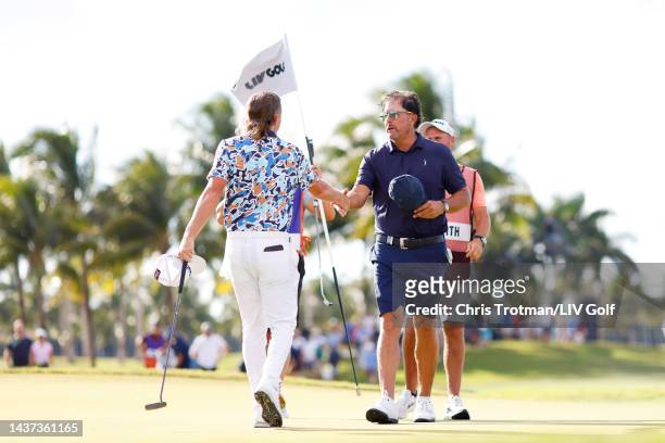 Team Captain Cameron Smith of Punch GC and Team Captain Phil Mickelson of Hy Flyers GC shake hands on the eighth green during the quarterfinals of...