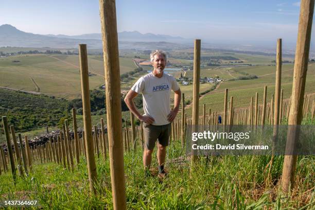 South African winemaker Duncan Savage oversees the planting of a new Syrah vineyard in the Echalas style on a steep south-eastern facing slope on the...