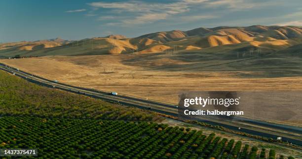 aerial shot of interstate 5 and farmland in stanislaus county - san joaquin valley stock pictures, royalty-free photos & images