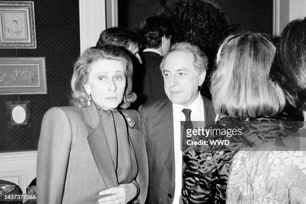 Micheline Maus and Pierre Berge attend an event, celebrating Paloma Picasso's 36th birthday and the launch of her perfume for Cosmair, at the Musee...
