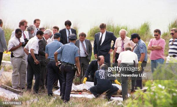 Police authorities at the scene of one of the murder victims of serial killer Joel Rifkin right next to Rockaway Turnpike near Kennedy Airport on...