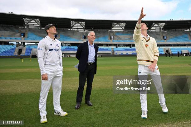 Jordan Silk of the Tigers and Peter Handscomb of the Bushrangers at the coin toss during the Sheffield Shield match between Tasmania and Victoria at...