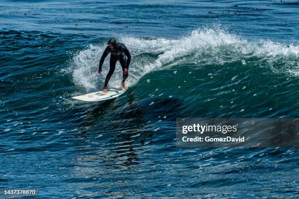 Topper Wave Riding 4,303 Riding A Wave Stock Photos, High-Res Pictures, and Images - Getty ...