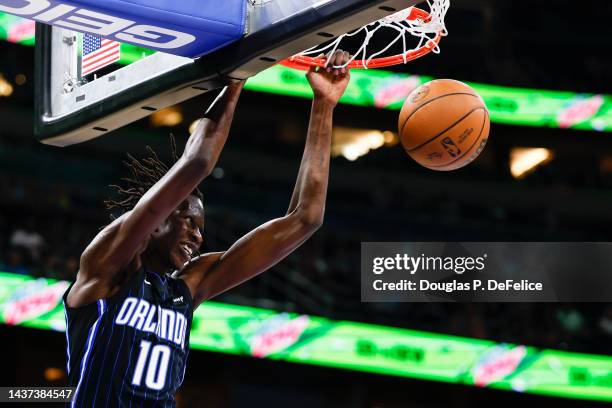 Bol Bol of the Orlando Magic slams the ball against the Charlotte Hornets during the first quarter at Amway Center on October 28, 2022 in Orlando,...