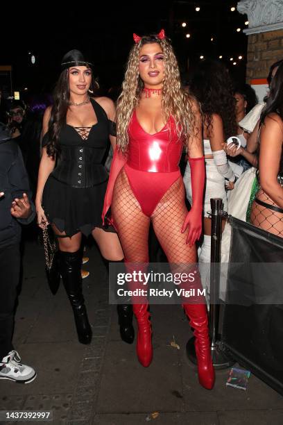 Antigoni Buxton and a guest are seen attending Maya Jama's Halloween party at Oslo Hackney on October 28, 2022 in London, England.