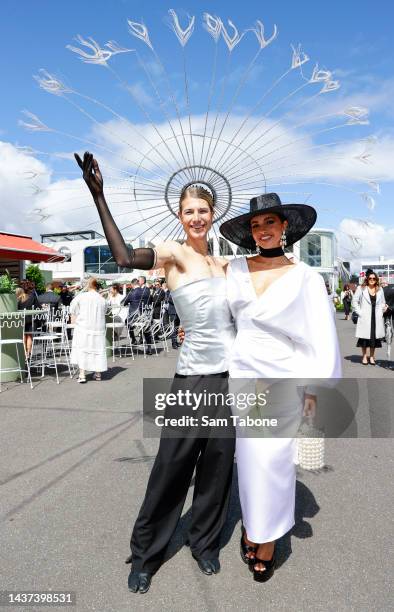 Christian Wilkins and Olivia Rogers attend Victoria Derby Day at Flemington Racecourse on October 29, 2022 in Melbourne, Australia.