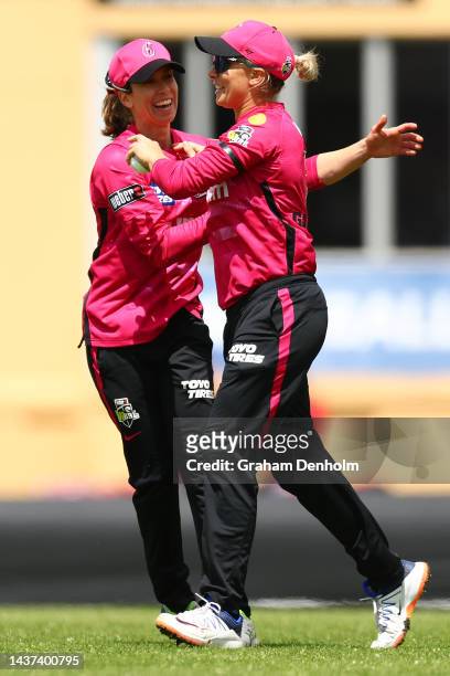 Ashleigh Gardner of the Sixers celebrates catching out Mignon du Preez of the Hurricanes during the Women's Big Bash League match between the Hobart...
