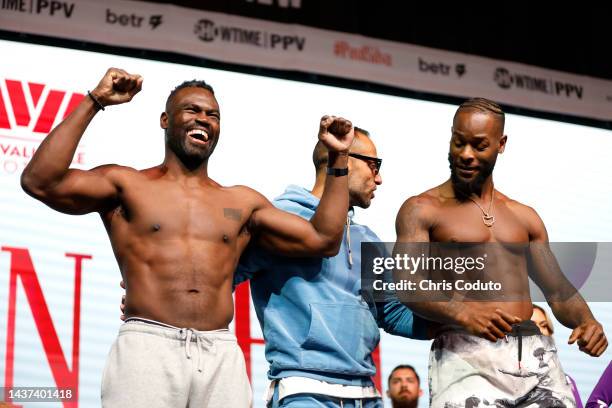 Uriah Hall and Le'Veon Bell pose during their official weigh in at Desert Diamond Arena on October 28, 2022 in Glendale, Arizona.