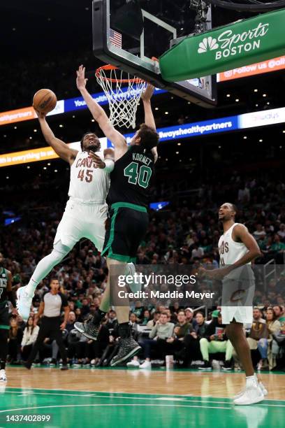 Donovan Mitchell of the Cleveland Cavaliers takes a shot against Luke Kornet of the Boston Celtics during the second half at TD Garden on October 28,...