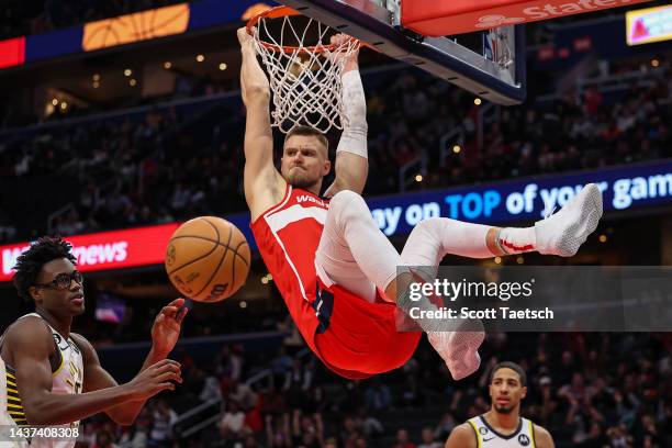 Kristaps Porzingis of the Washington Wizards dunks the ball against the Indiana Pacers during the second half at Capital One Arena on October 28,...