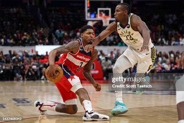 Bradley Beal of the Washington Wizards is hit in the neck by Aaron Nesmith of the Indiana Pacers during the second half at Capital One Arena on...