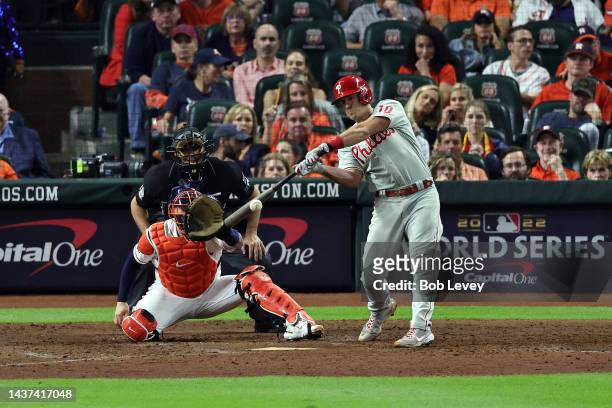 Realmuto of the Philadelphia Phillies hits a home run in the 10th inning against the Houston Astros in Game One of the 2022 World Series at Minute...