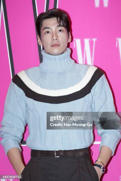 South Korean actor Kim Young-Kwang poses for photographs at the W Magazine Korea Breast Cancer Awareness Campaign 'Love Your W' at Four Seasons Hotel...