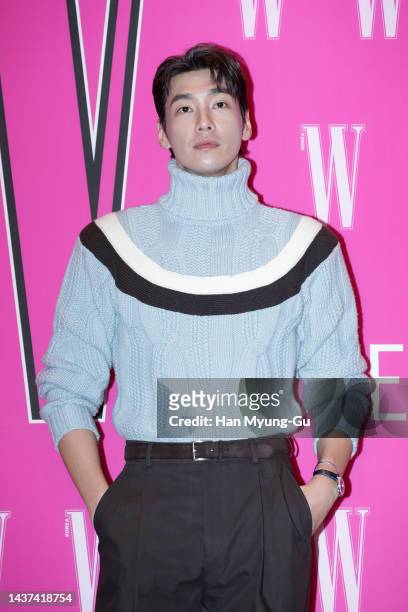 South Korean actor Kim Young-Kwang poses for photographs at the W Magazine Korea Breast Cancer Awareness Campaign 'Love Your W' at Four Seasons Hotel...