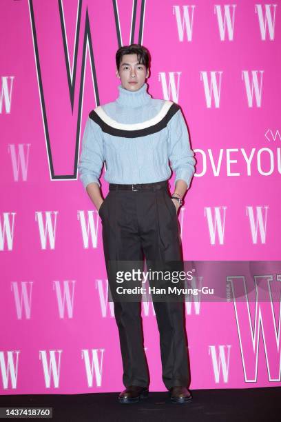 South Korean actor Kim Young-Kwang poses for photographs at the W Magazine Korea Breast Cancer Awareness Campaign 'Love Your W' at Four Seasons Hotel...