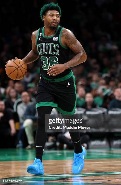 Marcus Smart of the Boston Celtics dribbles downcourt during the first half against the Cleveland Cavaliers at TD Garden on October 28, 2022 in...