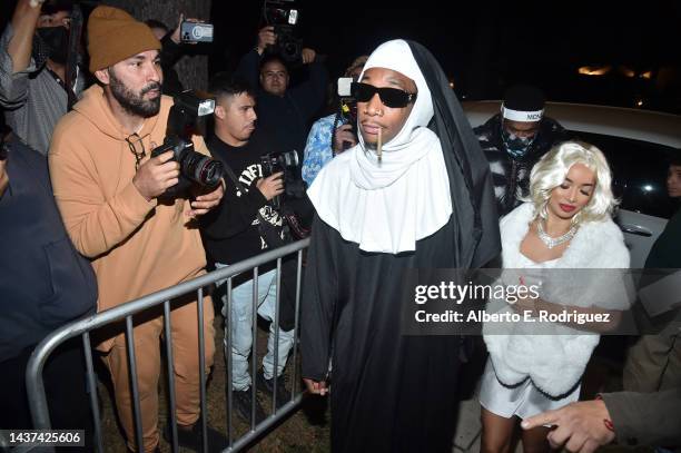 Wiz Khalifa and guest arrive to the Casamigos Halloween Party Returns In Beverly Hills on October 28, 2022 in Los Angeles, California.