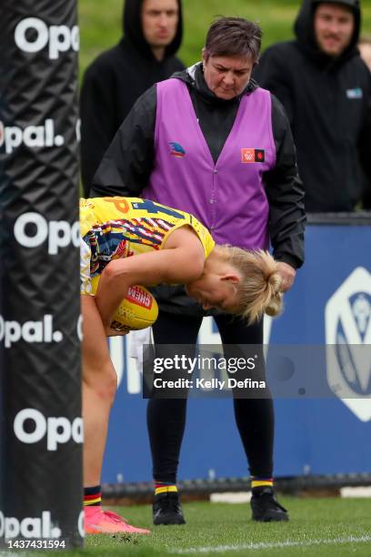 Ashleigh Woodland of the Crows is seen after a collision during the round 10 AFLW match between the St Kilda Saints and the Adelaide Crows at RSEA...