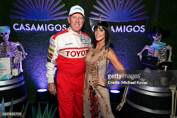 John Elway and Paige Elway attend the Casamigos Halloween Party Returns in Beverly Hills on October 28, 2022 in Beverly Hills, California.