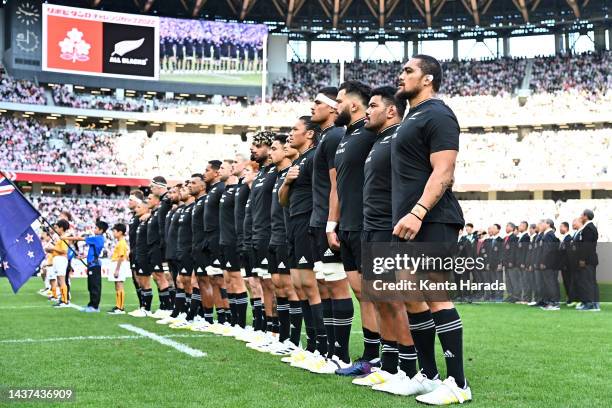 New Zealand players line up for the national anthem prior to the international test match between Japan and New Zealand All Blacks at National...