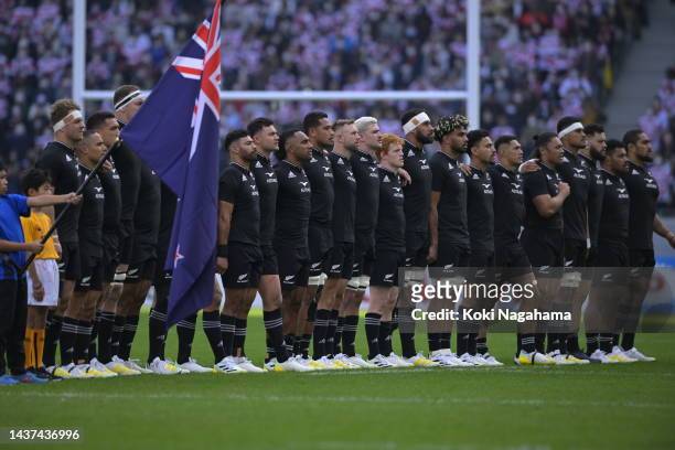 New Zealand players line up for the national anthem prior to the international test match between Japan and New Zealand All Blacks at National...