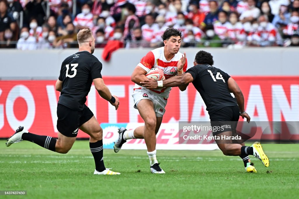 Dylan Japan Rugby Dylan Riley of Japan is tackled by Seve Reece of New Zealand during ...