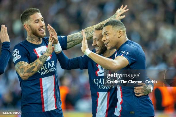 October 25: Kylian Mbappé of Paris Saint-Germain celebrates with Sergio Ramos of Paris Saint-Germain Neymar of Paris Saint-Germain after scoring his...