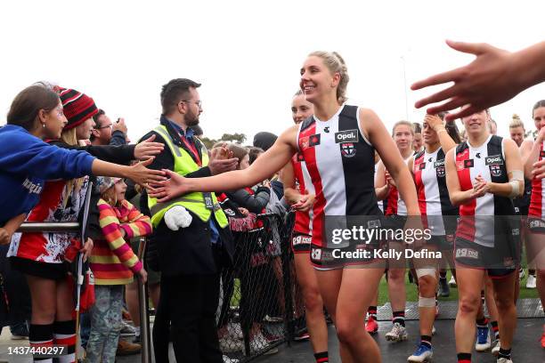 Saints thank supporters during the round 10 AFLW match between the St Kilda Saints and the Adelaide Crows at RSEA Park on October 29, 2022 in...