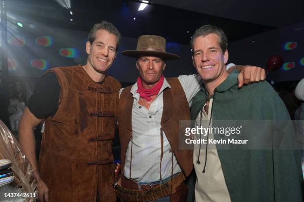 Tyler Winklevoss, Rande Gerber and Cameron Winklevoss attend the Casamigos Halloween Party Returns in Beverly Hills on October 28, 2022 in Beverly...
