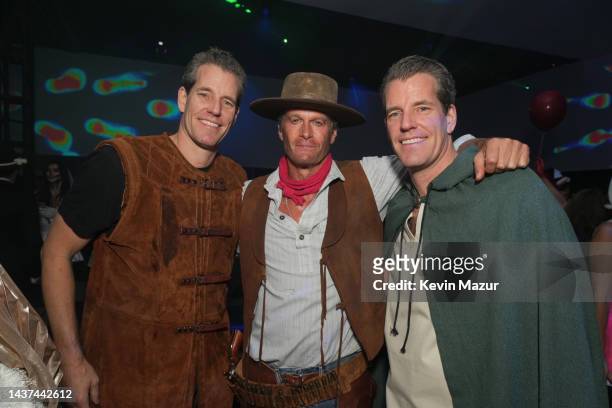 Tyler Winklevoss, Rande Gerber and Cameron Winklevoss attend the Casamigos Halloween Party Returns in Beverly Hills on October 28, 2022 in Beverly...
