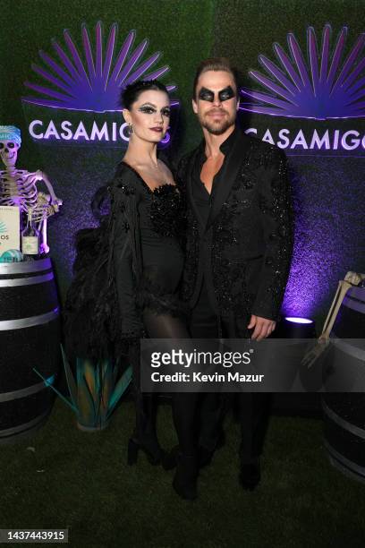 Hayley Erbert and Derek Hough attend the Casamigos Halloween Party Returns in Beverly Hills on October 28, 2022 in Beverly Hills, California.